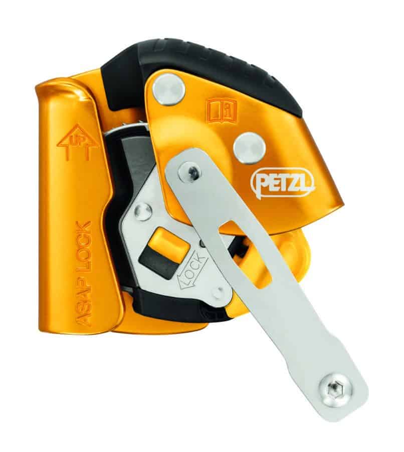 A close-up of an orange and black Petzl ASAP LOCK, vital for fall protection in tactical rescue training, featuring a lever and safety info.