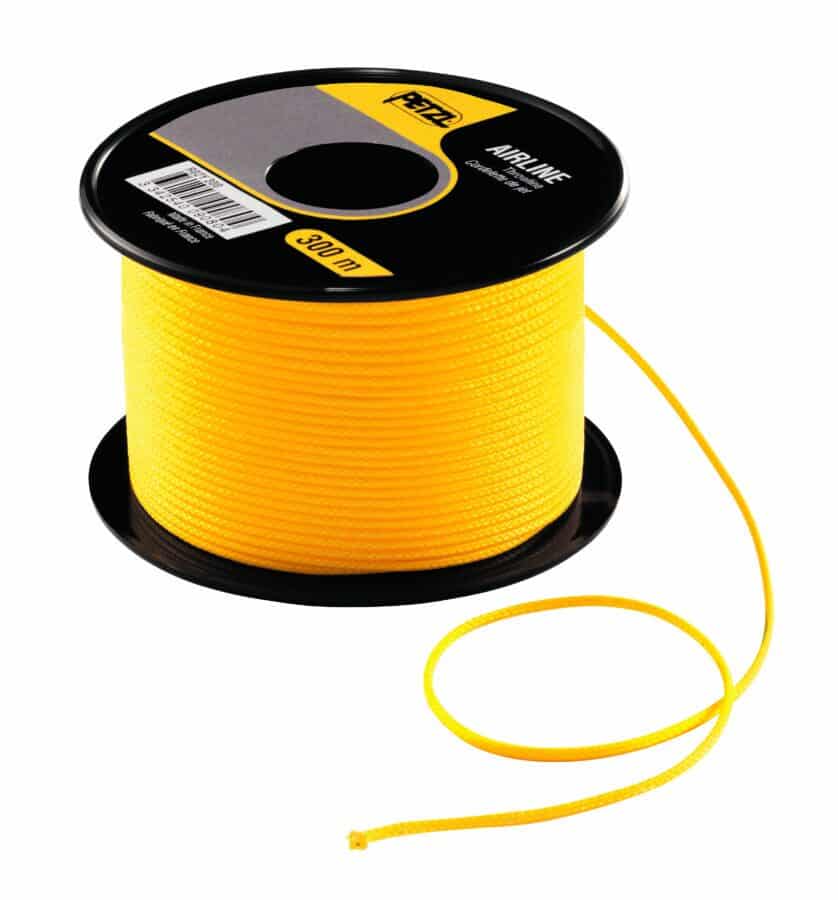 A spool of yellow rope for tactical rescue training, with a black top and base, labeled 300 meters. A loose end is coiled beside the spool.