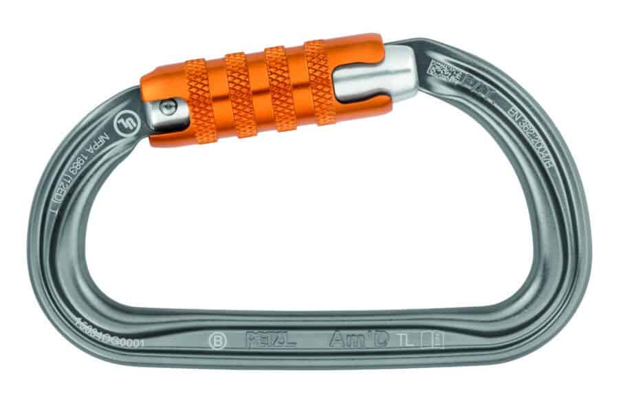 A silver and orange climbing carabiner with a screw-lock mechanism, ideal for industrial rescue, labeled with safety and manufacturing info.