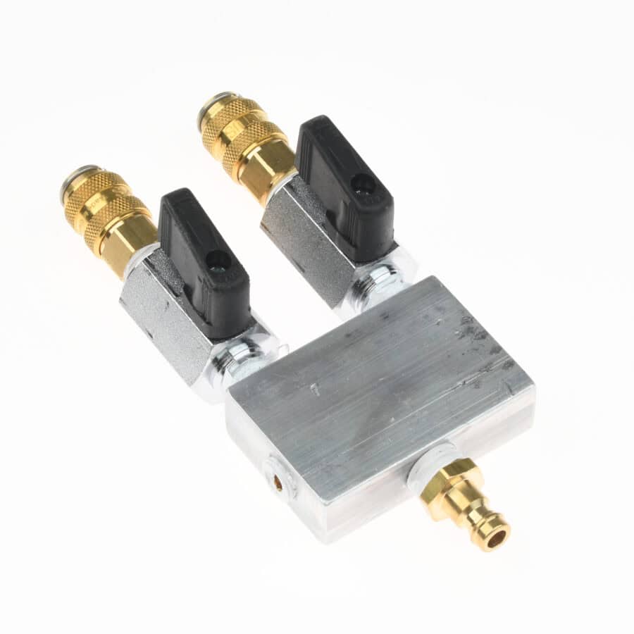 A metal valve splitter with two brass connectors on top, one at the bottom, ideal for tactical rescue training, set against a white background.