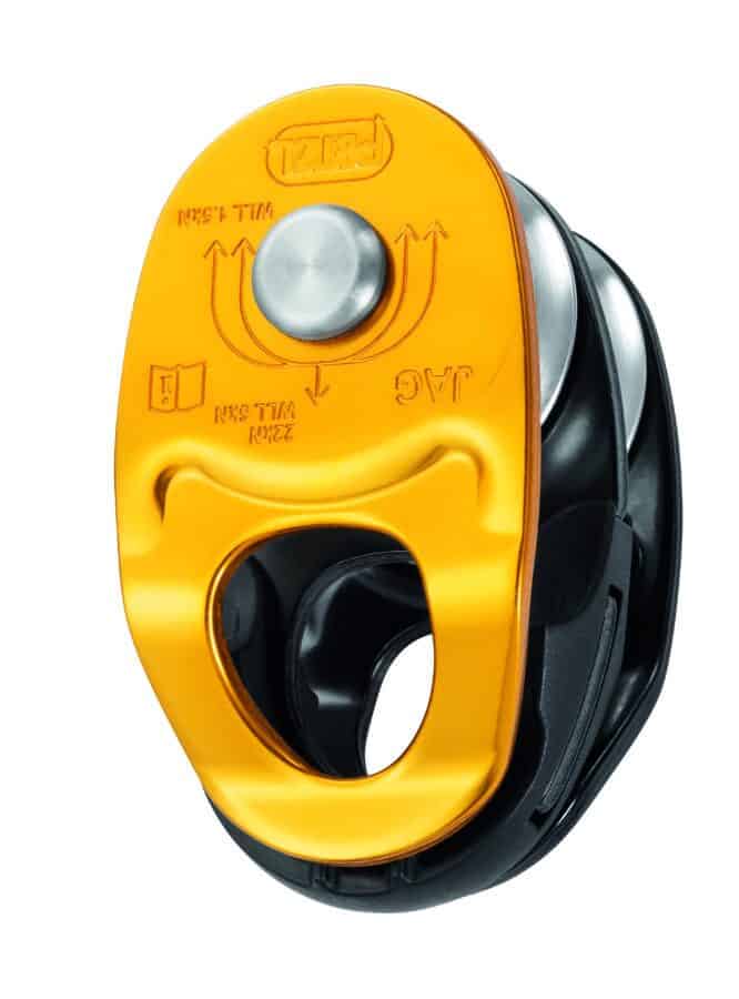 A yellow and black pulley device for industrial rescue, with a circular metal wheel featuring engraved safety instructions and brand logo.