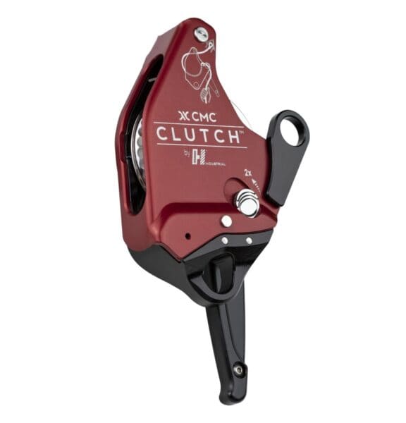 A red and black CMC Clutch mechanical device with a handle, used for controlled descent and rope management in industrial or fire rescue operations.