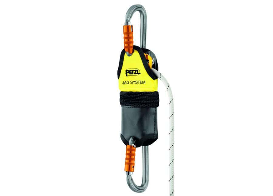 Close-up of a Petzl Jag System used in industrial rescue, featuring yellow and black components, a white rope, and carabiners with orange accents.
