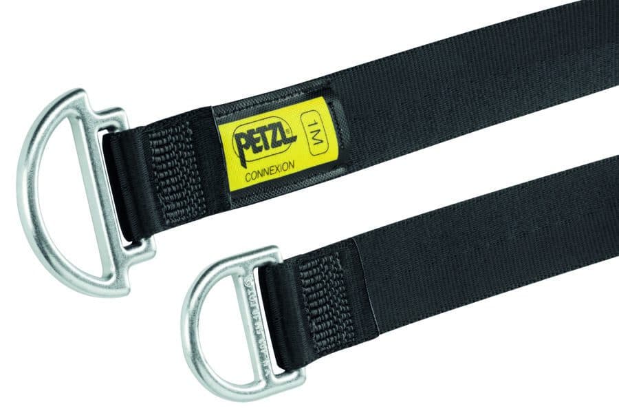 Black Petzl Connexion strap with metal D-rings on each end, ideal for fire rescue, featuring a yellow label indicating size M.