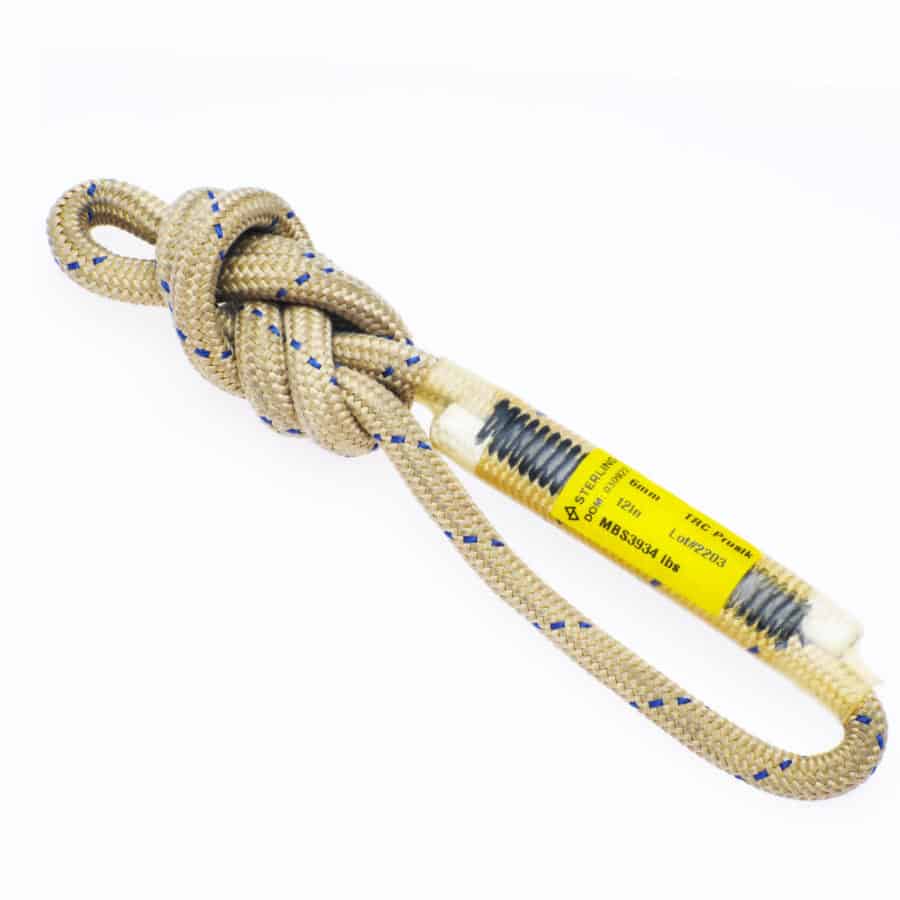 A coiled rope with a knot and yellow label, featuring blue-thread accents, ideal for industrial rescue, isolated on a white background.